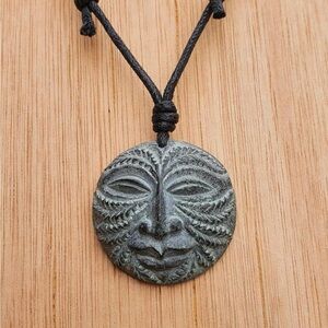 Carved green man necklace on adjustable cord